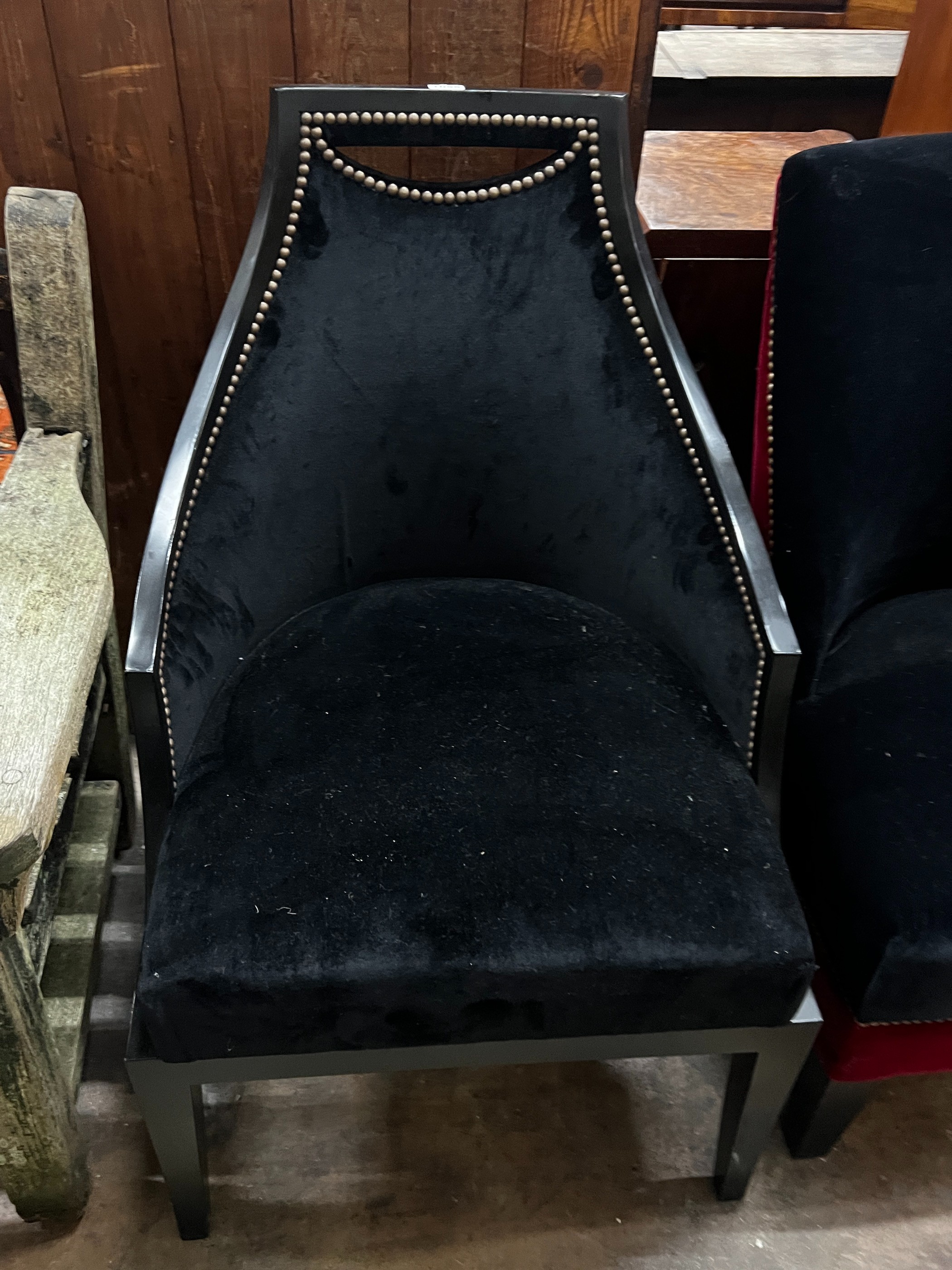 Two upholstered ebonised side chairs, larger height 94cm